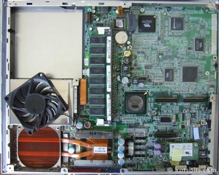 Back off and laptop insides exposed - graphics chip/card fits bottom right