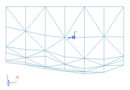 Typical example of a trisouped mesh - a terrain section created by cutting up brushes into separate triangular components that are they grouped together to form a larger 'mesh' object